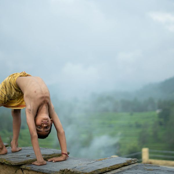 Person in a meditative yoga pose feeling energetic and balanced.